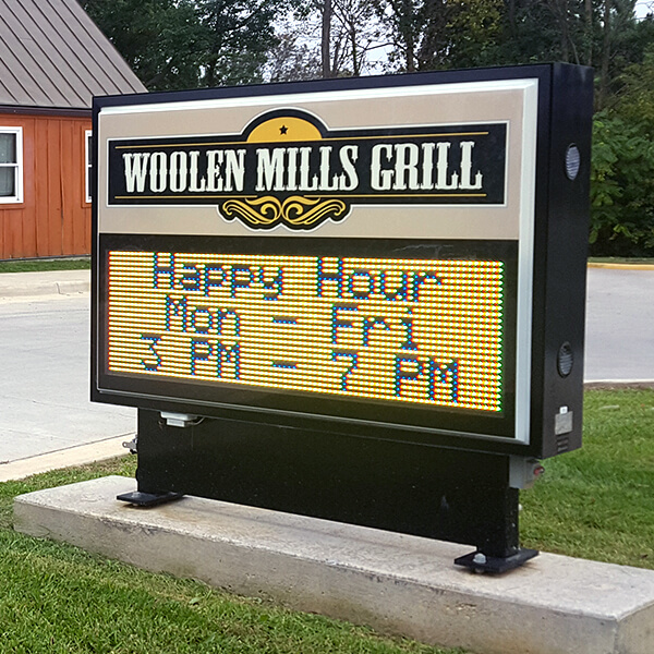 Business Sign for Woolen Mills Grill