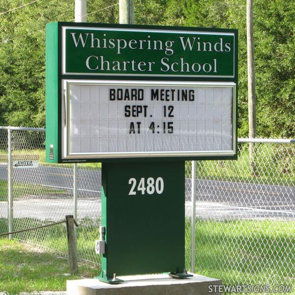 School Sign for Whispering Winds Charter School