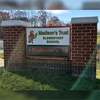 School Sign for Madison's Trust Elementary School